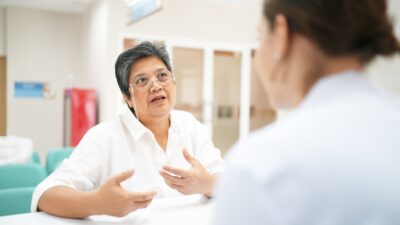 Behavioral healthcare professional has workforce consultation with manager