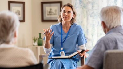 Psychologist at behavioral health facility interacting with seniors