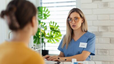 Professional at behavioral health facility acquiring information to add to incident report
